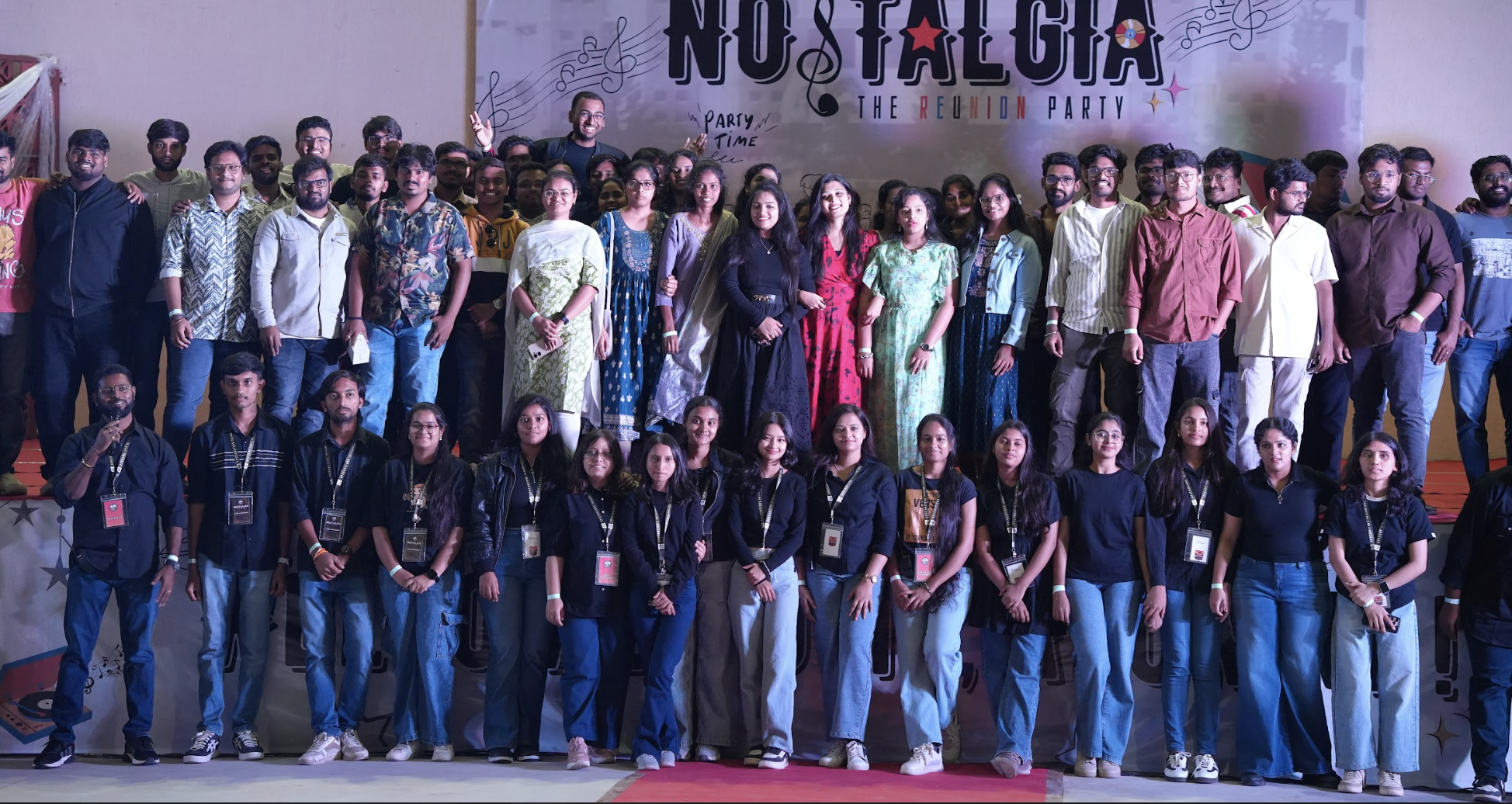 Alumni group photograph on stage